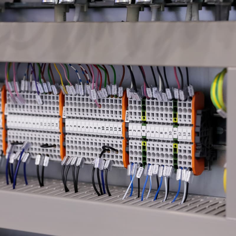 ac socket terminal block installed inside industrial control panel